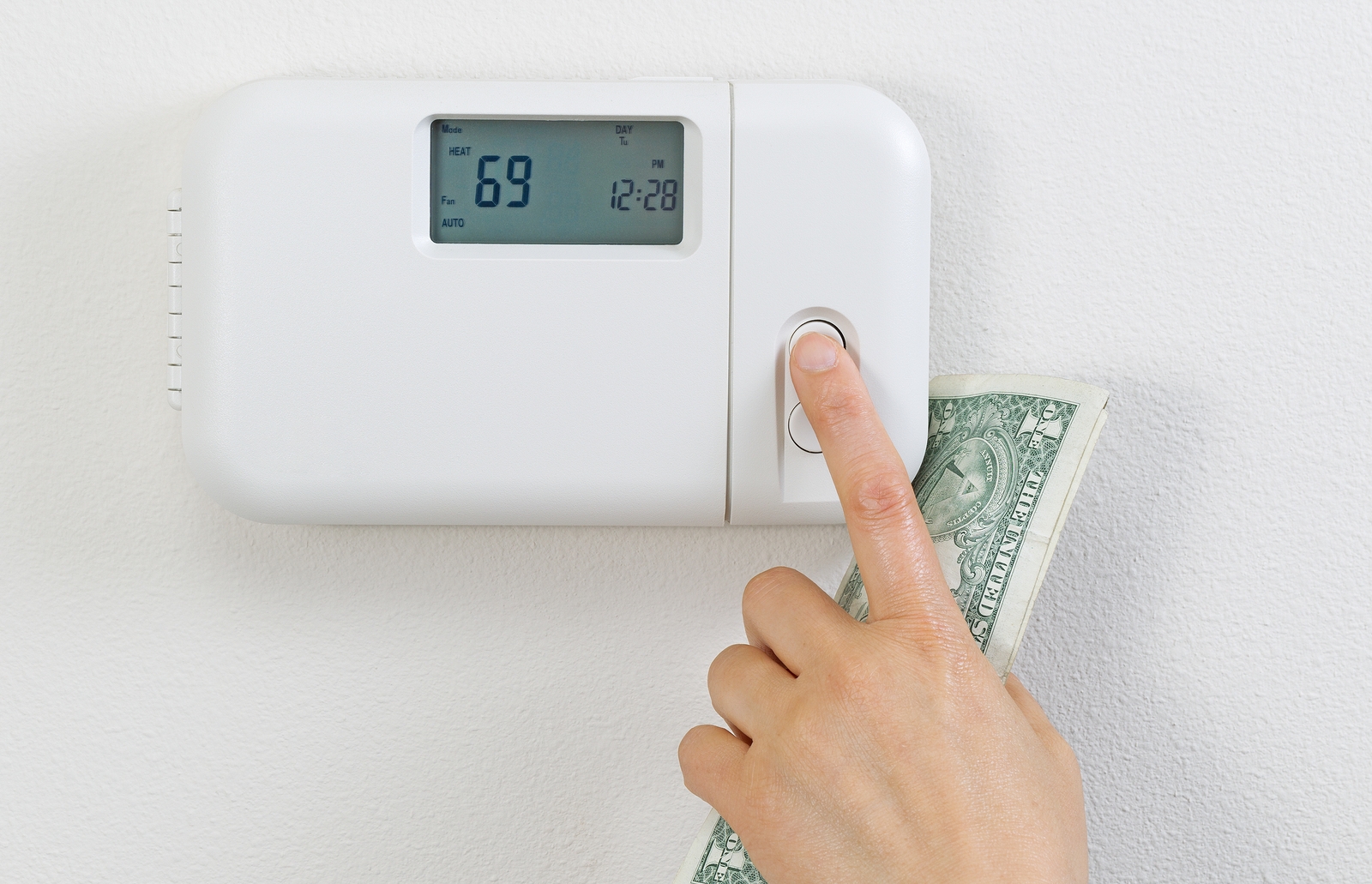 bigstock-Saving-Money-From-Heating-Home-92061596