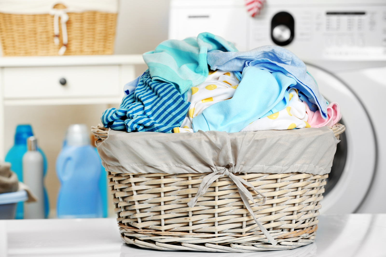 bigstock-Clothes-in-wicker-basket-at-la-168301703