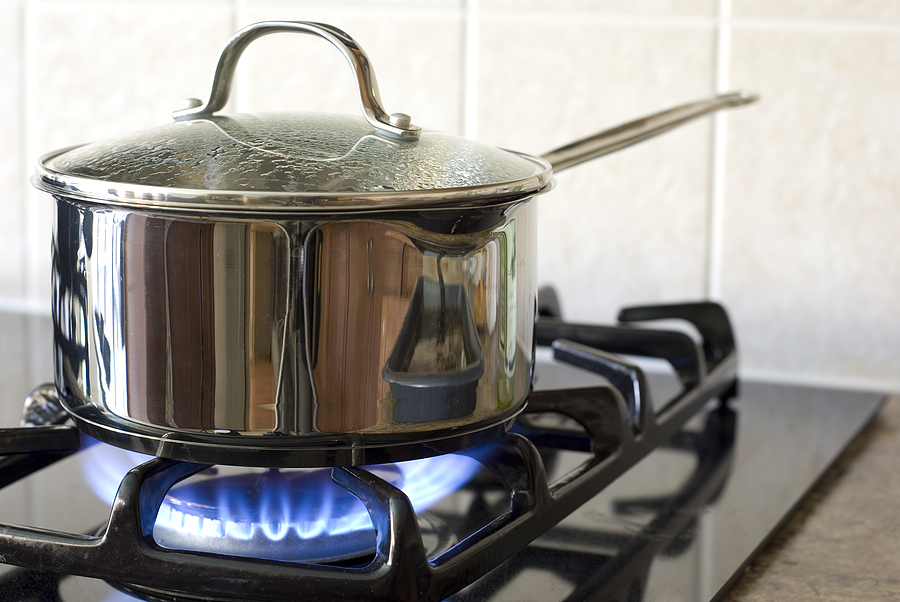 bigstock-stainless-steel-pot-on-a-gas-s-3767954