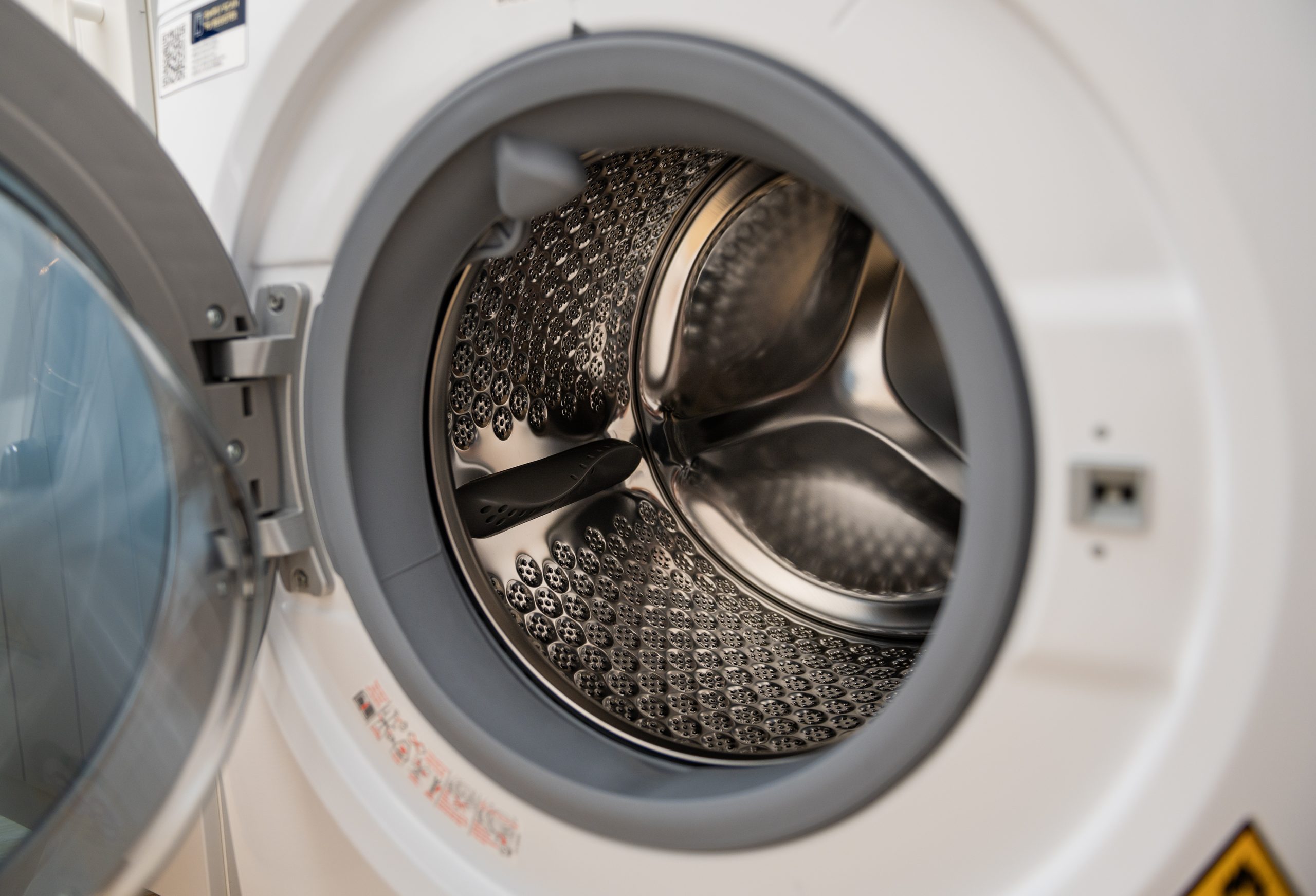 close-up-laundry-washing-machine-in-home-2024-12-22-23-18-23-utc-scaled